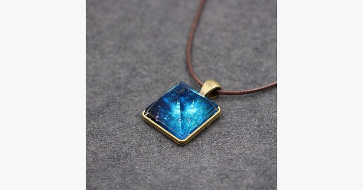 Glowing Pyramid Pendant With Blue Crystal Add Some Shine And Color To Your Collection